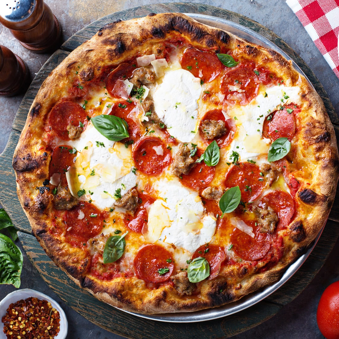 Hand-tossed pepperoni pizza at Gino’s Pizza, Pasta & Co. in Federal Way